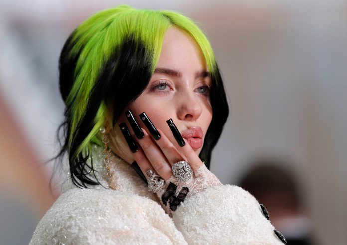 In this Feb. 9, 2020, file photo, singer Billie Eilish arrives at the Oscars in Los Angeles.