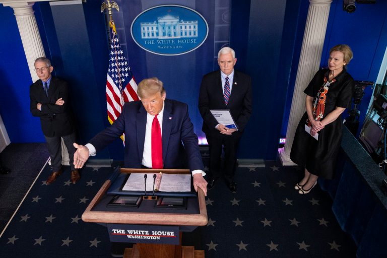 In this March 26, 20202, photo, President Donald Trump speaks about the coronavirus accompanied by Dr. Anthony Fauci, left, director of the National Institute of Allergy and Infectious Diseases, Vice President Mike Pence, and Dr. Deborah Birx, White House coronavirus response coordinator, in the James Brady Briefing Room in Washington.