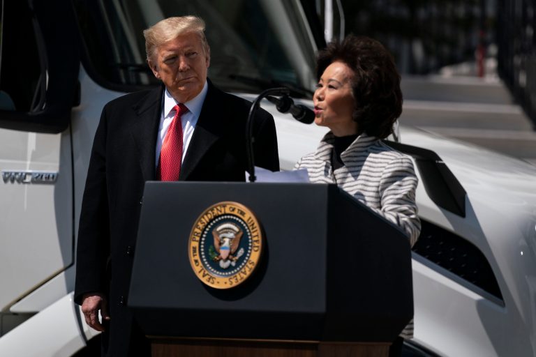 President Donald Trump listens as Secretary of Transportation Elaine Chao speaks during an event celebrating American truckers, at the White House, Thursday, April 16, 2020, in Washington.