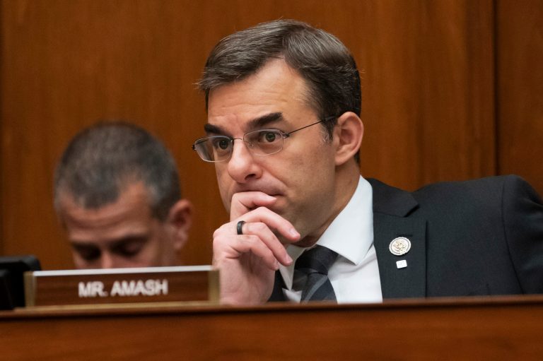FILE - In this June 12, 2019, file photo, Rep. Justin Amash, (R-MI), listens to debate on Capitol Hill in Washington. (AP Photo/J. Scott Applewhite, File )