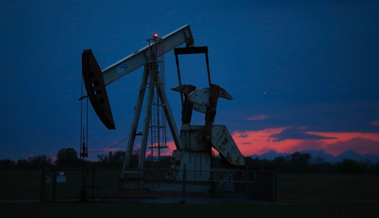 In this April 21, 2020 file photo, a pumpjack is pictured as the sun sets in Oklahoma City.