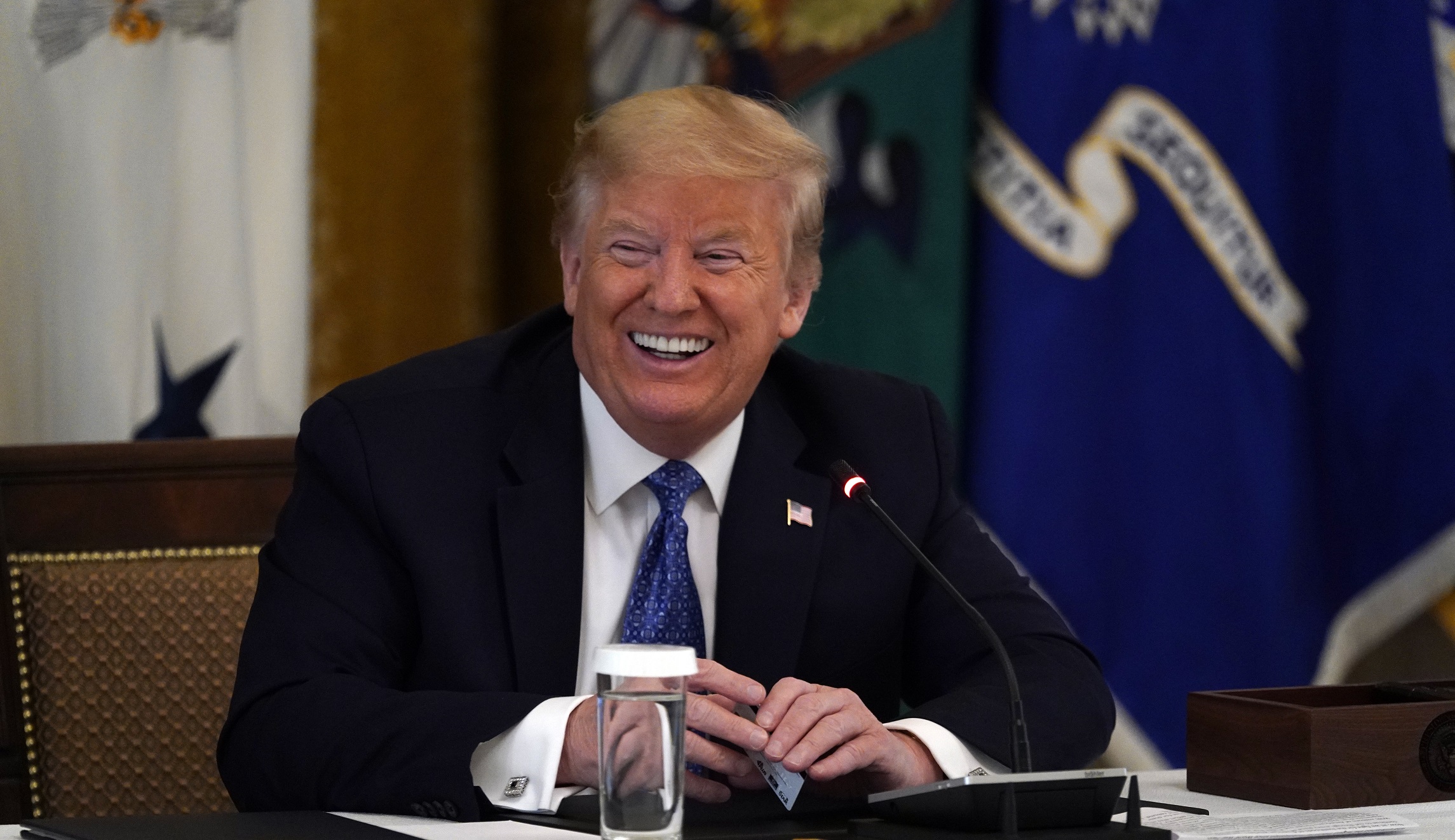 ‘I didn’t want to give the press the pleasure’: Trump taunts media over mask wearing