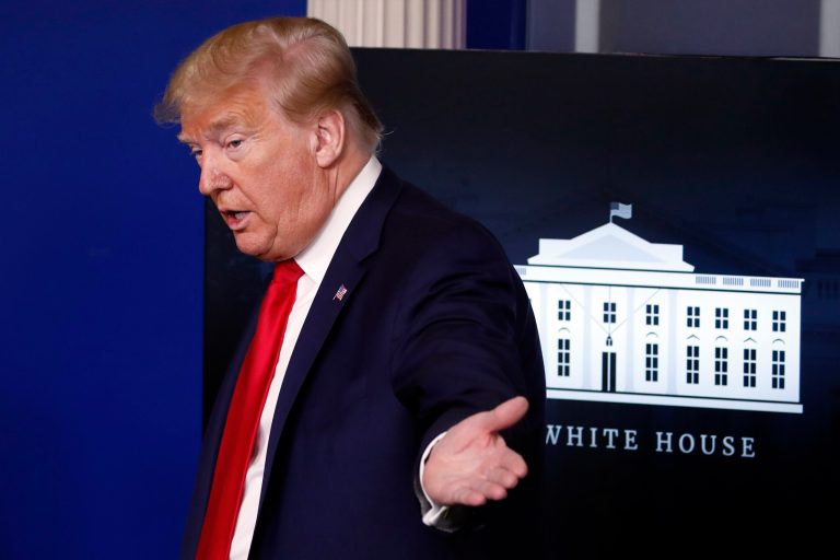 President Donald Trump gestures in a press conference Friday.