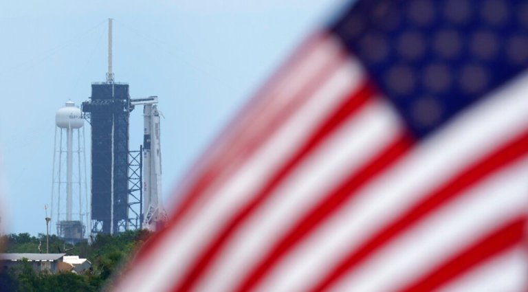 A SpaceX Falcon 9 sits on Launch Pad 39-A at the Kennedy Space Center in Cape Canaveral, Fla.. (AP Photo/David J. Phillip)
