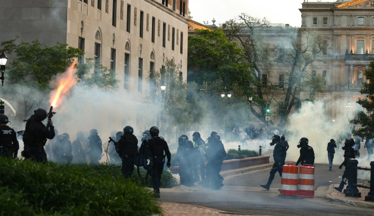 A thousand people protest police brutality at the Lansing Capitol