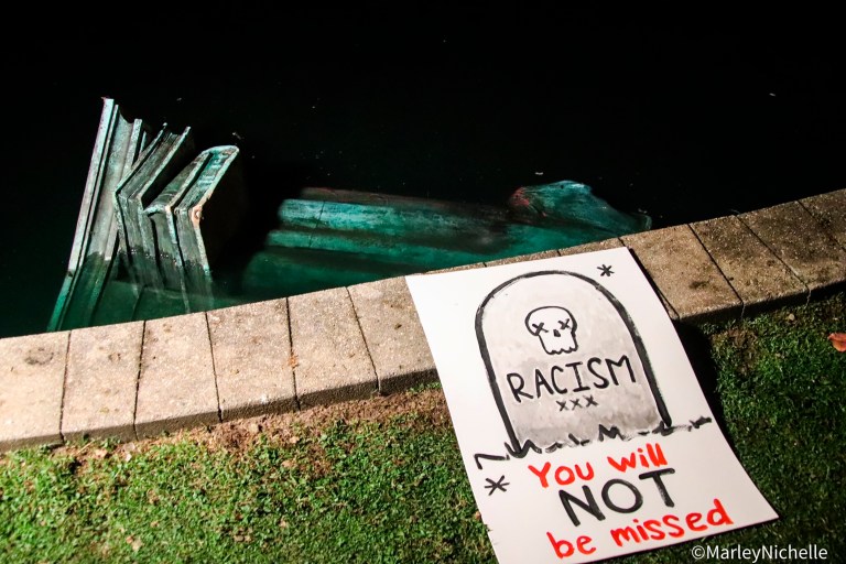 A statue of Christopher Columbus in the water at Byrd Park in Richmond, Virginia.