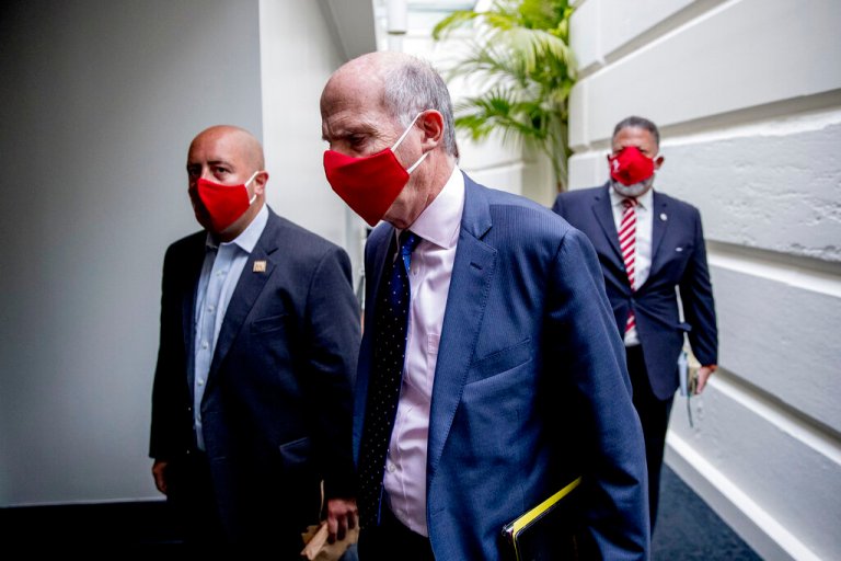 D.C. Council Chairman Phil Mendelson, center, and District of Columbia Mayor Muriel Bowser's Chief of Staff John Falcicchio, left, arrive for a news conference on District of Columbia statehood on Capitol Hill, Tuesday, June 16, 2020, in Washington.