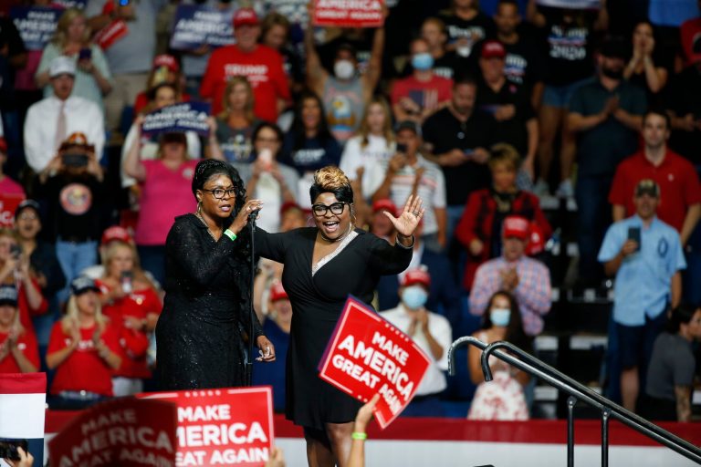 Lynnette Hardaway, left, and Rochelle Richardson, known as Diamond and Silk, speak during a campaign rally for President Donald Trump in Tulsa, Okla., Saturday, June 20, 2020.