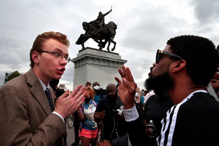 ‘He’s gonna come down’: Black Lives Matter and Christian activists clash in St. Louis over statue of city’s namesake