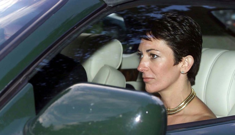 In this Sept. 2, 2000 file photo, British socialite Ghislaine Maxwell, driven by Britain's Prince Andrew leaves the wedding of a former girlfriend of the prince, Aurelia Cecil, at the Parish Church of St Michael in Compton Chamberlayne near Salisbury, England. The FBI said Thursday July 2, 2020, Ghislaine Maxwell, who was accused by many women of helping procure underage sex partners for Jeffrey Epstein, has been arrested in New Hampshire. 