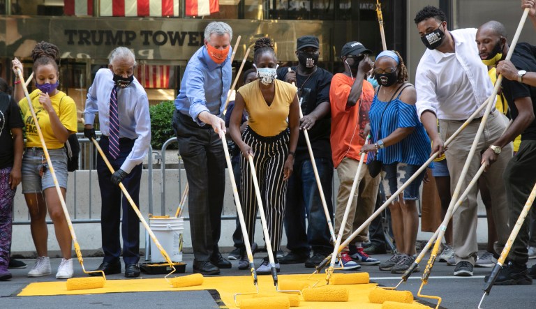 Bill de Blasio and Al Sharpton spotted helping paint Black Lives Matter mural outside Trump Tower