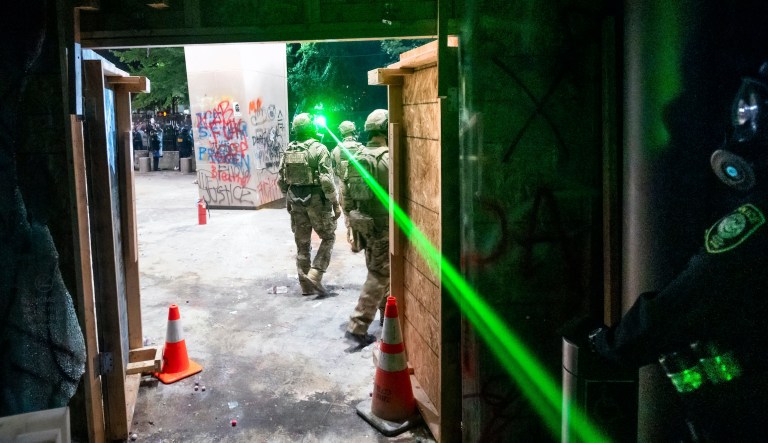 Dozens charged with federal crimes in Portland riots