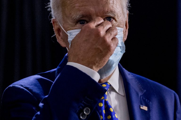 Democratic presidential candidate former Vice President Joe Biden speaks with members of the audience as he leaves a campaign event at the William "Hicks" Anderson Community Center in Wilmington, Del., Tuesday, July 28, 2020.
