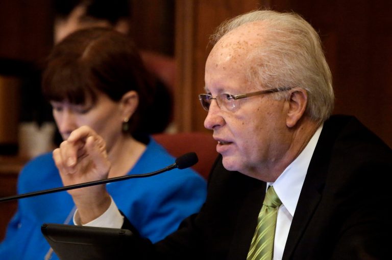 Illinois state senator, suspected of wearing wire, resigns ethics post after tax evasion charge