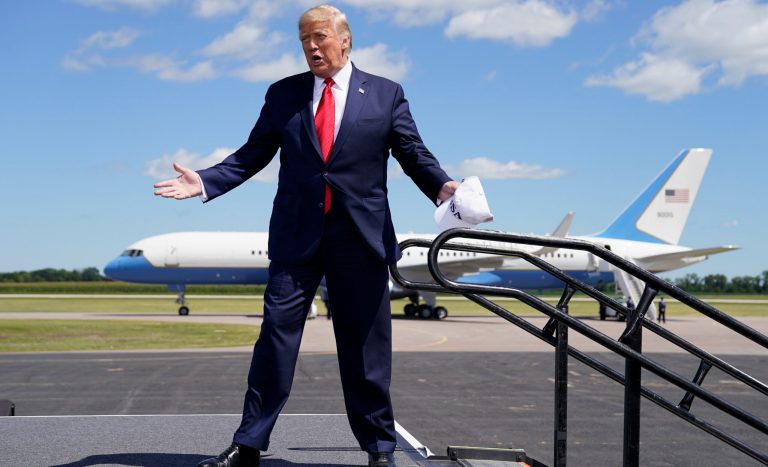 President Donald Trump arrives to speak to a crowd of supporters at Mankato Regional Airport, Monday, Aug. 17, 2020, in Mankato, Minn.