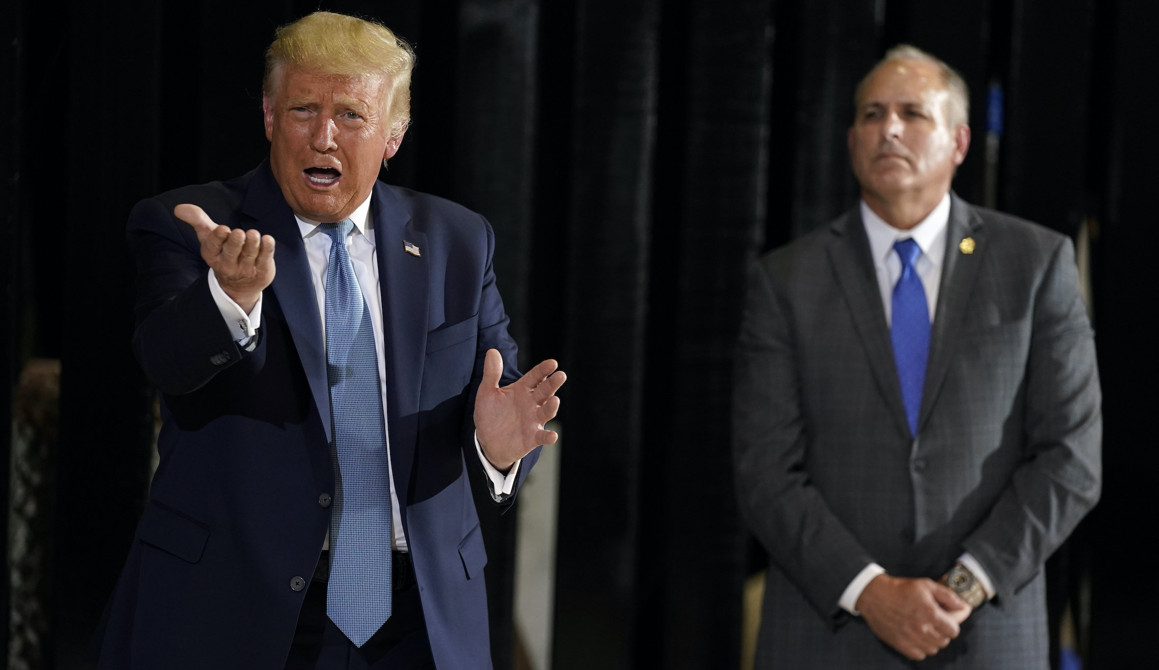 At US-Mexico border, Trump says 300 miles of wall nearly complete