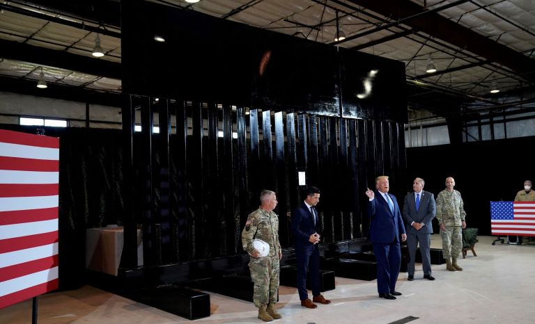 President Donald Trump speaks during a briefing on border wall construction in Yuma, Ariz. (AP Photo/Evan Vucci)