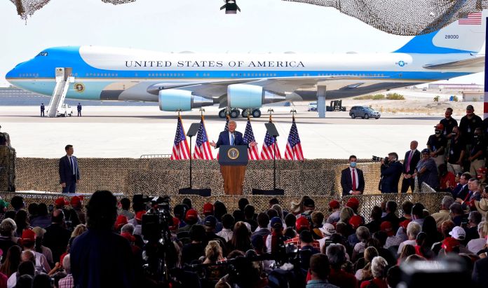 President Donald Trump speaks to a crowd of supporters at the Yuma International Airport in Yuma, Ariz.