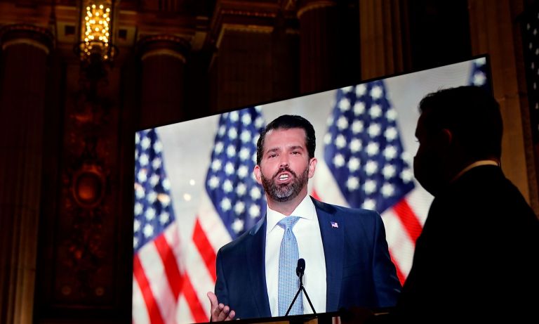 Donald Trump Jr., is seen on a video monitor as he tapes his speech for the first day of the Republican National Convention from the Andrew W. Mellon Auditorium in Washington.