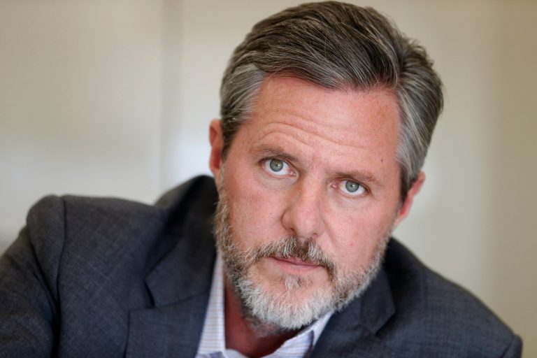 Liberty University President Jerry Falwell Jr., pauses during an interview in his office at the school in Lynchburg, Va. On Tuesday, Aug. 25, 2020, Falwell said that he has submitted his resignation as head of evangelical Liberty University. 
