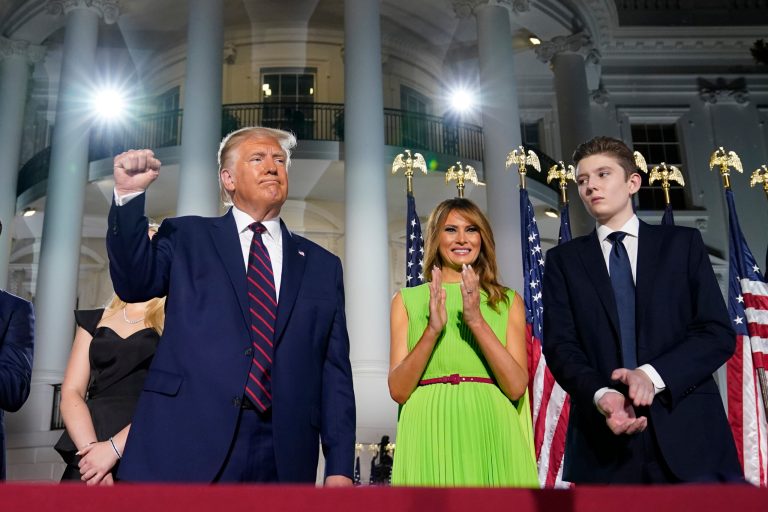 President Donald Trump, first lady Melania Trump and Barron Trump stand on the South Lawn of the White House on the fourth day of the Republican National Convention Thursday.
