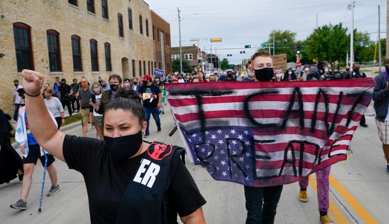 Civil rights lawsuit accuses Kenosha police of selectively enforcing curfew during riots