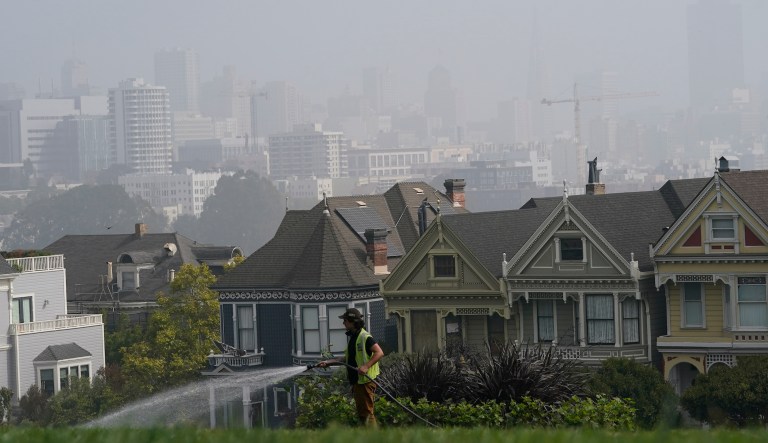 Wildfires largely contained after powerful Santa Ana winds took down power lines