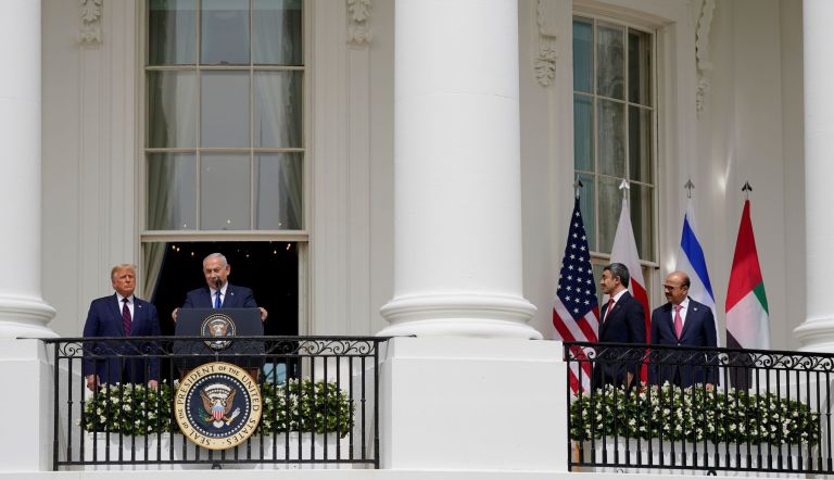Israeli Prime Minister Benjamin Netanyahu speaks, as President Donald Trump looks on, left, and United Arab Emirates Foreign Minister Abdullah bin Zayed al-Nahyan and Bahrain Foreign Minister Khalid bin Ahmed Al Khalifa, look on right, during the Abraham Accords signing ceremony on the South Lawn of the White House.