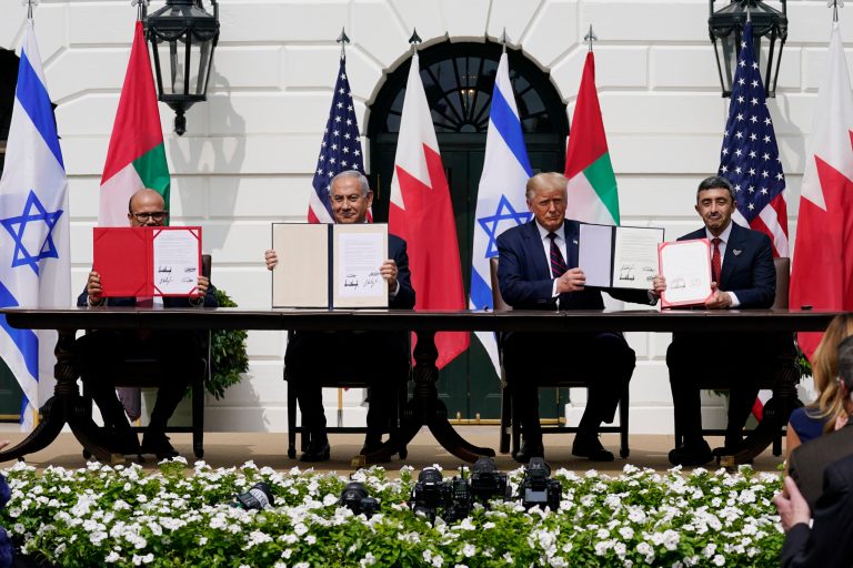 President Donald Trump, center, with from left, Bahrain Foreign Minister Khalid bin Ahmed Al Khalifa, Israeli Prime Minister Benjamin Netanyahu, Trump, and United Arab Emirates Foreign Minister Abdullah bin Zayed al-Nahyan, during the Abraham Accords signing ceremony on the South Lawn of the White House, Tuesday, Sept. 15, 2020, in Washington.