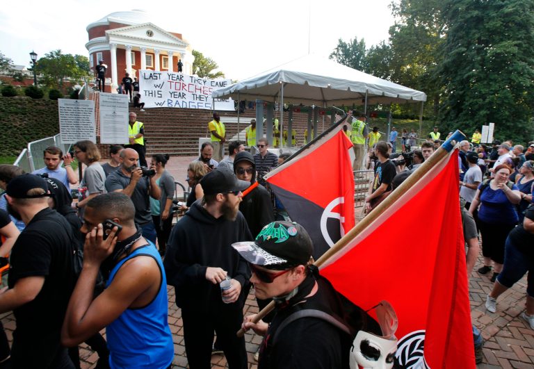 A group of anti-fascist and Black Lives Matter demonstrators march in front of the Rotunda on the campus of the University of Virginia in August 2018 in anticipation of the anniversary of the previous year's Unite the Right rally in Charlottesville, Va.