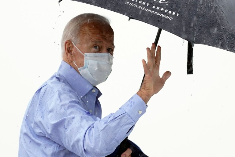 Democratic presidential candidate and mask advocate Joe Biden boards a plane at New Castle Airport in New Castle, Del., Tuesday to Cleveland for the first presidential debate against President Donald Trump.