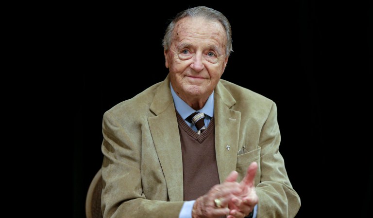 FILE - In this Wednesday, Jan. 10, 2018, file photo, retired Florida State NCAA college football coach Bobby Bowden applauds following a Rotary Club luncheon in Omaha, Neb. Bowden, hospitalized last week after contracting COVID-19,  says he is feeling better and hopes to go home soon. Bowden, 90, told the Tallahassee Democrat on Monday, Oct. 12, 2020,"I am doing good. I appreciate everyoneâs thoughts, I really do.â 