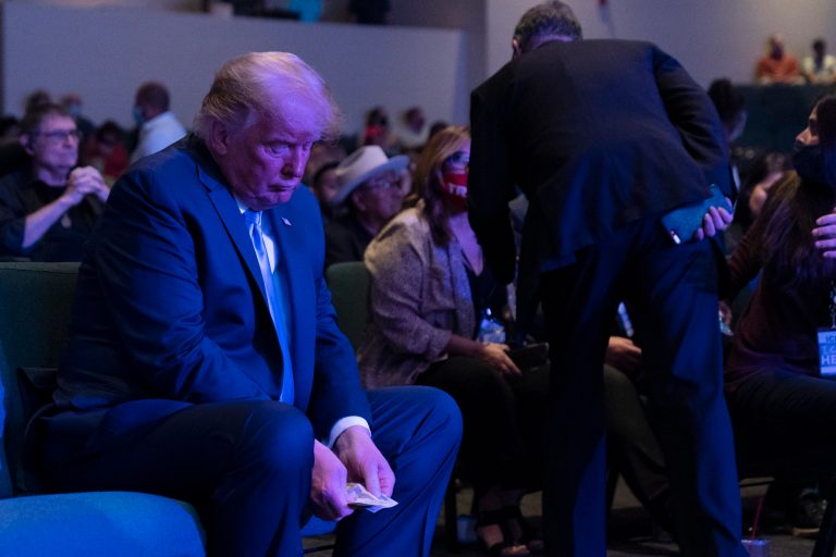 Trump spotted putting handful of $20 bills in donation bucket of Las Vegas church