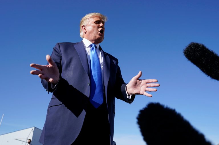 President Donald Trump talks to the media after stepping off Air Force One at Reno-Tahoe International Airport, Sunday, Oct. 18, 2020, in Reno, Nev.