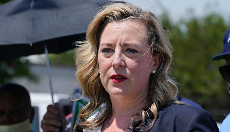 In this Tuesday, Aug. 18, 2020, file photo, U.S. Rep. Kendra Horn, D-Okla., speaks during a news conference in front of a post office in Oklahoma City.