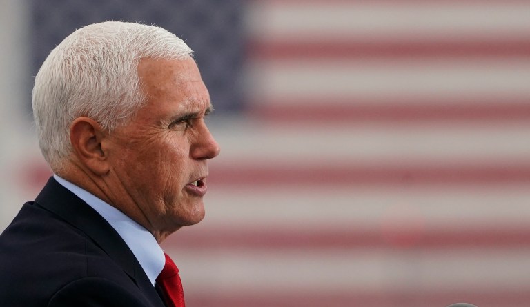 Pence adds COVID-19 precautions but stays on campaign trail after aides test positive