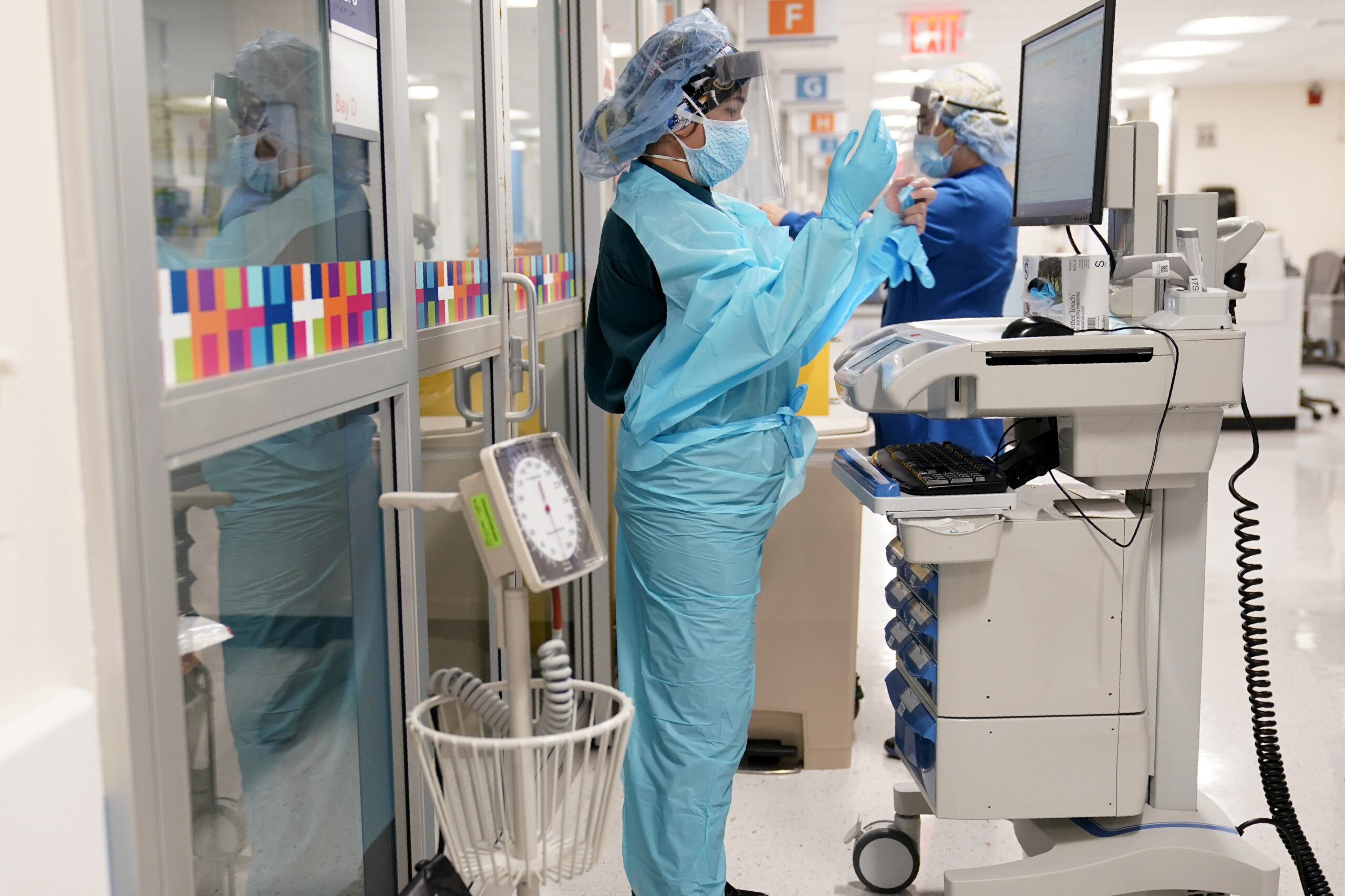US breaks records on COVID-19 hospitalizations and cases