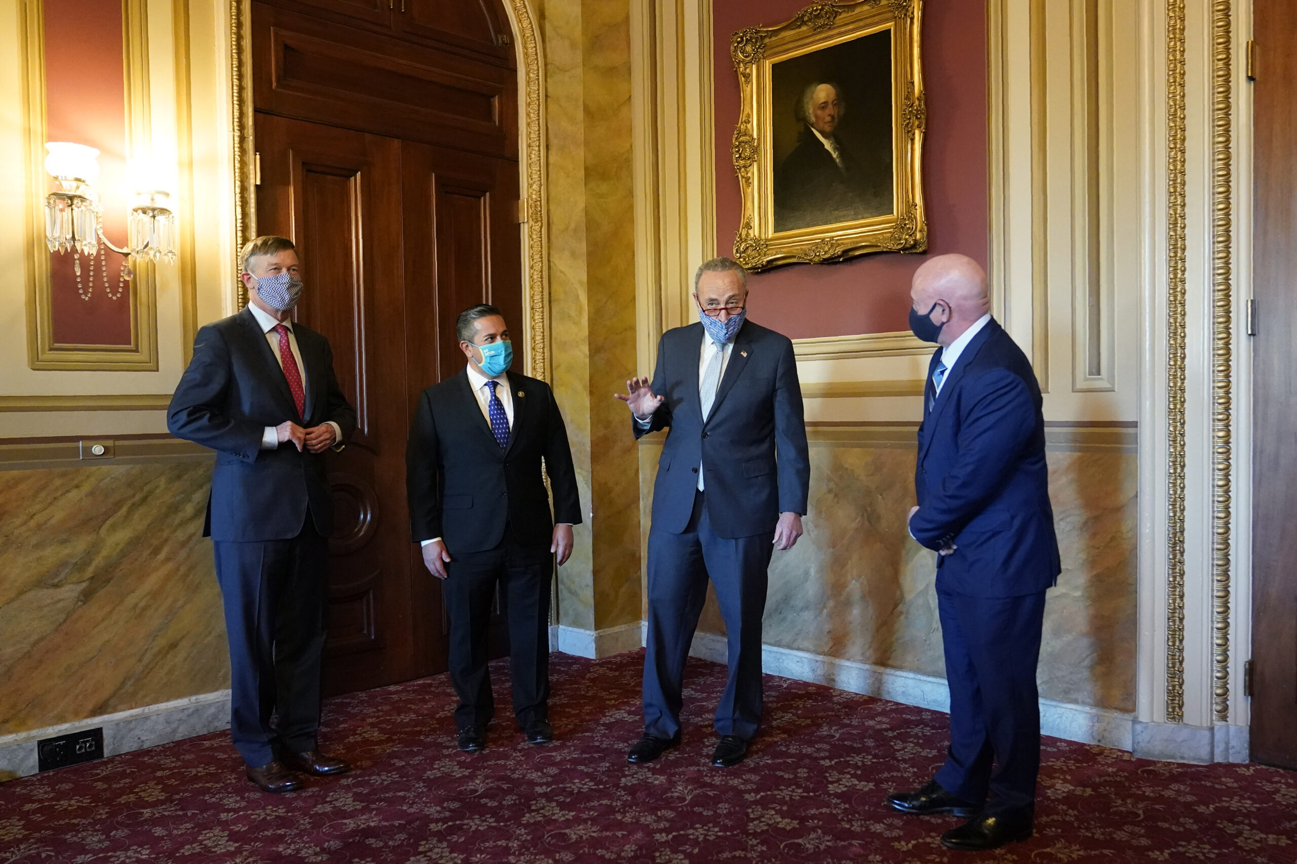 John Hickenlooper, Ben Ray Lujan, Chuck Schumer, Mark Kelly