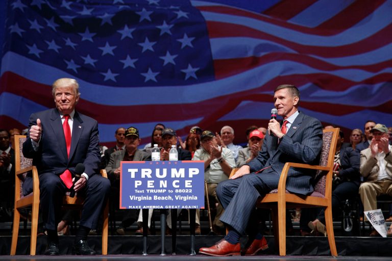 Retired Lt. Gen. Michael Flynn, shown in 2016 getting a thumbs up from Donald Trump, will make his first address since his pardoning. It will be at a prayer rally events held for Trump in Washington Saturday.