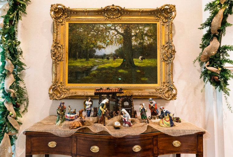 The vice president's official residence foyer is decorated with Christmas wreaths intertwined with burlap and twinkle lights with a nativity scene on the side table. The 2020 Christmas decorations theme "Old Fashioned Christmas" was unveiled by Karen Pence the wife of the Vice President Mike Pence.