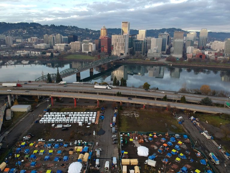 Portland sued for tossing homeless belongings