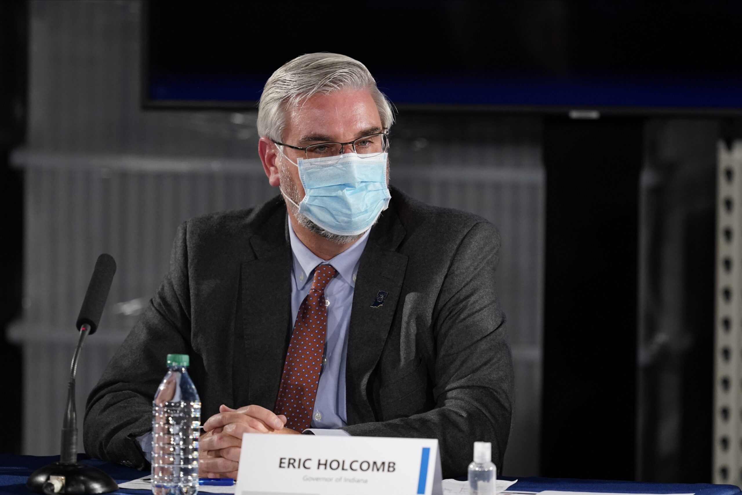 Holcomb drops Indiana mask mandate, renews health emergency through April