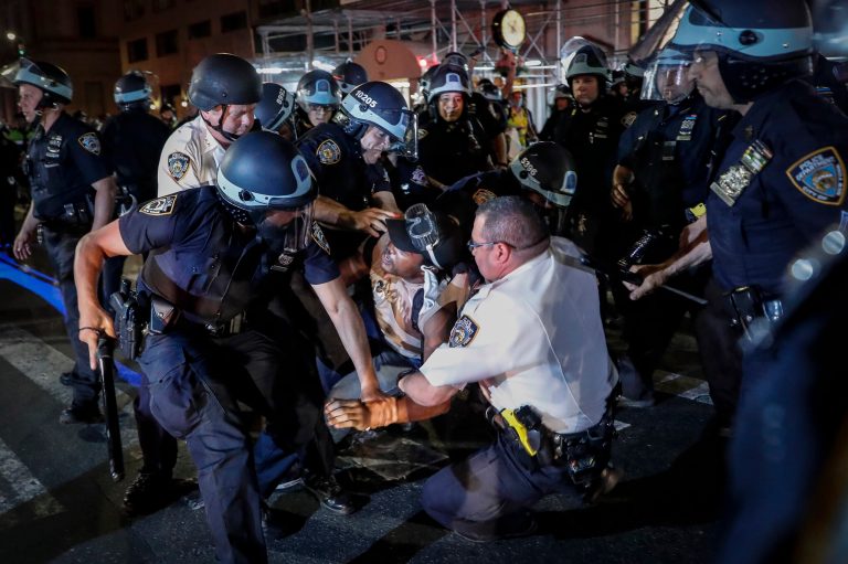 Violent confrontation between police and Black Lives Matter protesters nets nearly 30 arrests