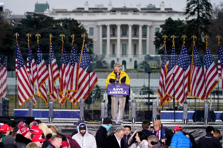 With the White House in the background, Rep. Mo Brooks, R-Ark., speaks Wednesday, Jan. 6, 2021, in Washington, at a rally in support of President Donald Trump called the "Save America Rally." Brooks is a leader in the plan to challenge Electoral Votes today in Congress.