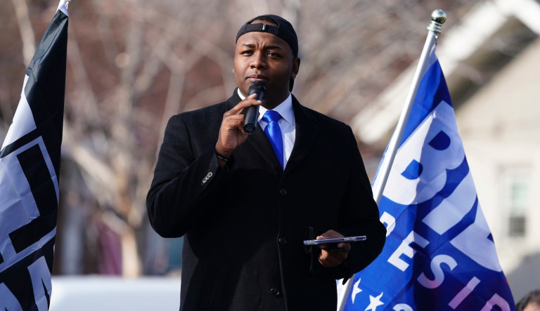 Tay Anderson, at-large director on the Denver School Board, speaks during a gathering calling for the impeachment of President Donald Trump at South High School before a car rally through the streets of downtown Sunday, Jan. 10, 2021, in Denver.