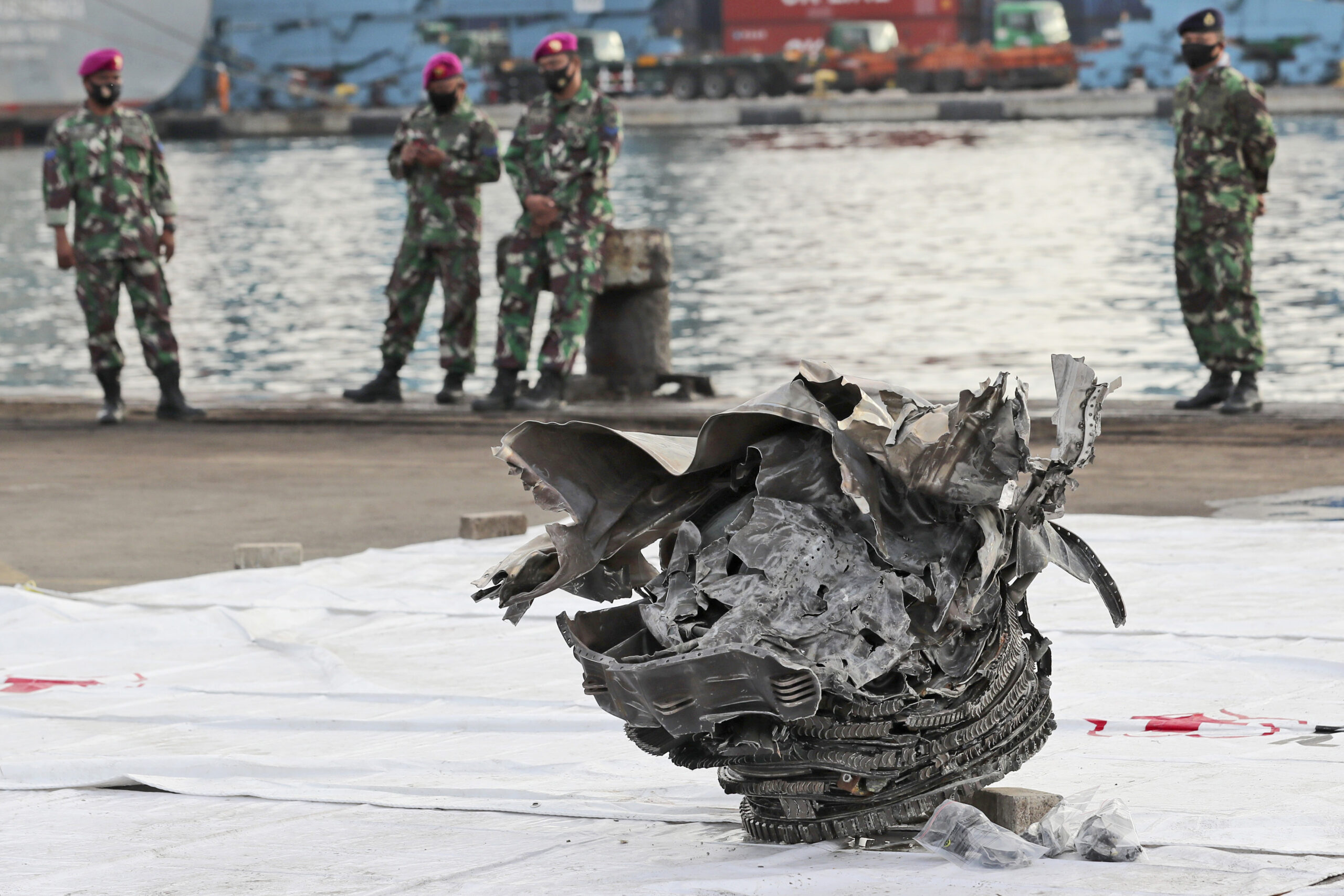 Divers recover flight data recorder from crashed Indonesian passenger plane