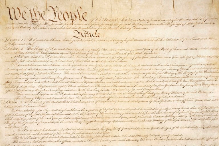 This photo made available by the U.S. National Archives shows a portion of the first page of the United States Constitution. According to NPD BookScan, which tracks around 85 percent of the print market, more than 1 million copies of the Constitution in various editions were sold since Trump took office. The sales are especially notable because the Constitution can be read or downloaded for free, including from the U.S. government. 