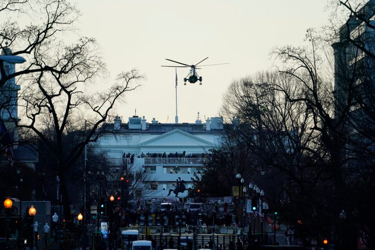 Marine-One carrying President Donald Trump and Melania Trump departs the White House ahead of President-elect Joe Biden's inauguration ceremony, Wednesday, Jan. 20, 2021, in Washington. (AP Photo/Matt Slocum)