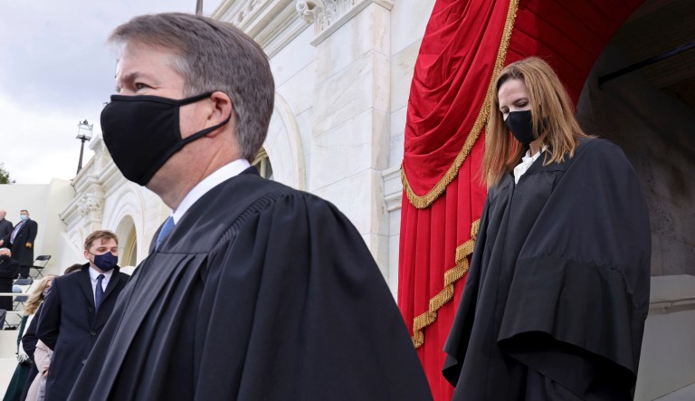 Supreme Court Justices Brett  Kavanaugh and Amy Coney Barrett arrive for the inauguration of Joe Biden as the 46th President of the United States on the West Front of the U.S. Capitol in Washington, U.S., January 20, 2021.