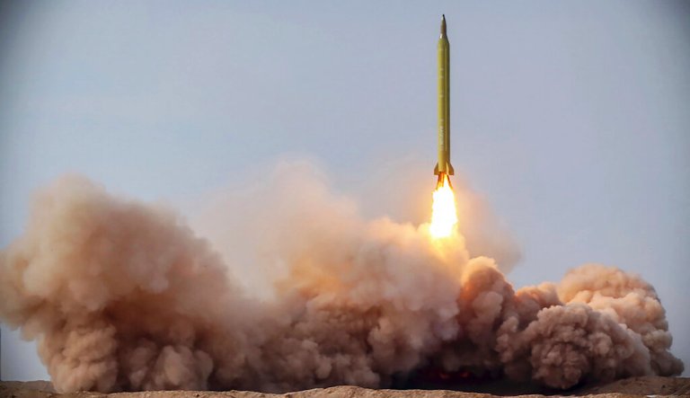 In this photo released on Saturday, Jan. 16, 2021, by the Iranian Revolutionary Guard, a missile is launched in a drill in Iran. Iran's paramilitary Revolutionary Guard forces on Friday held a military exercise involving ballistic missiles and drones in the country's central desert, state TV reported, amid heightened tensions over Tehran's nuclear program and a U.S. pressure campaign against the Islamic Republic.